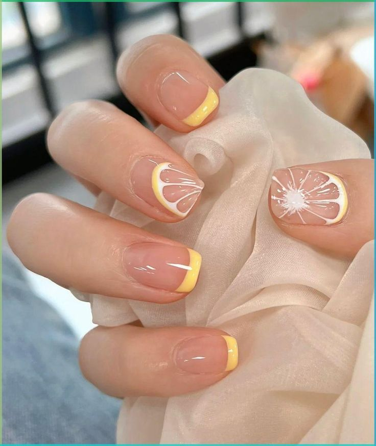 yellow sunflower nails French manicure with lemon accent on short square nails, glossy nude base, soft yellow tips