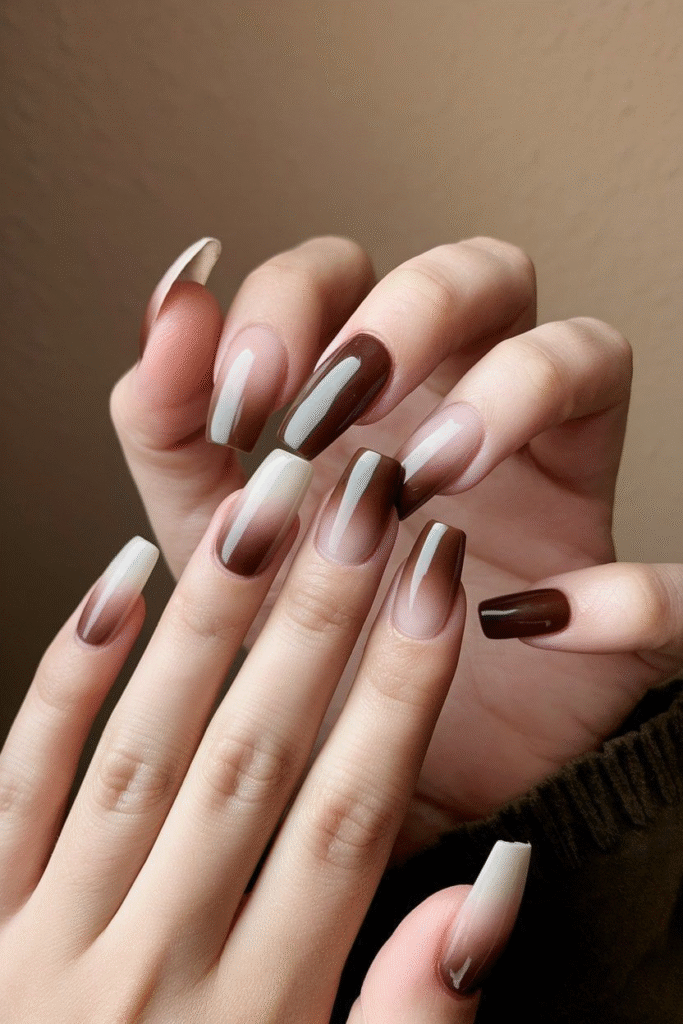 Coffin nails with taupe-to-espresso ombré and solid brown accents.