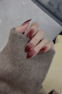 Nude to wine jelly ombré on almond nails with glossy top.