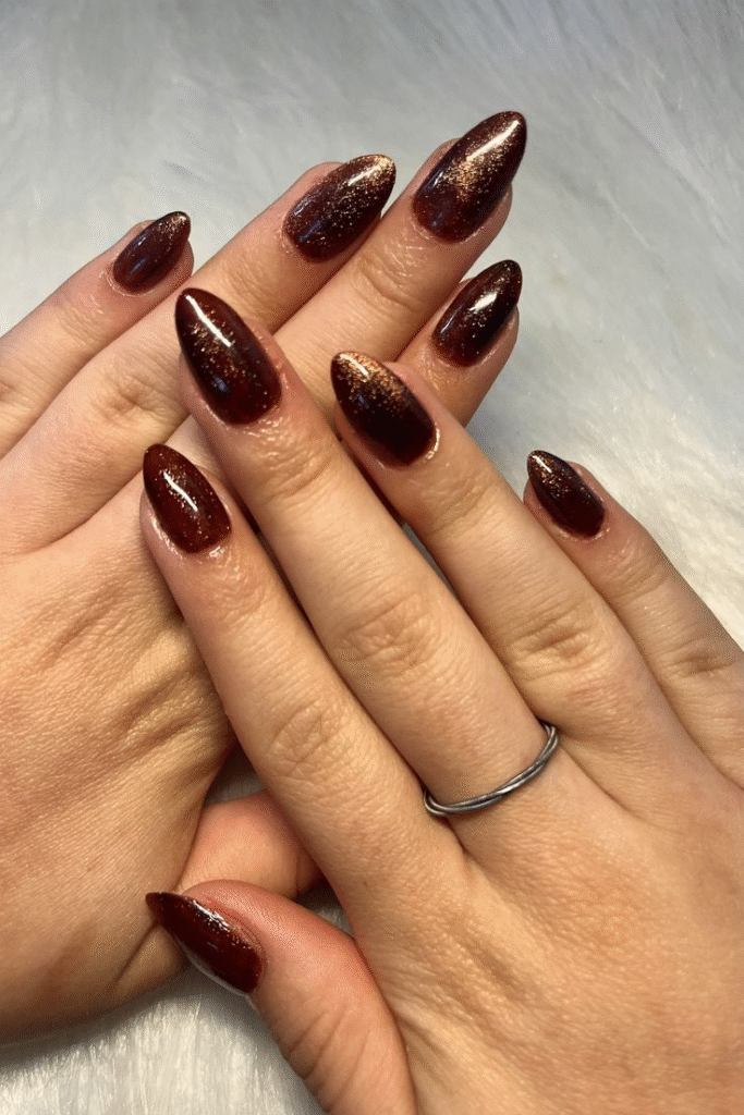 Chocolate gold-shift magnetic manicure.